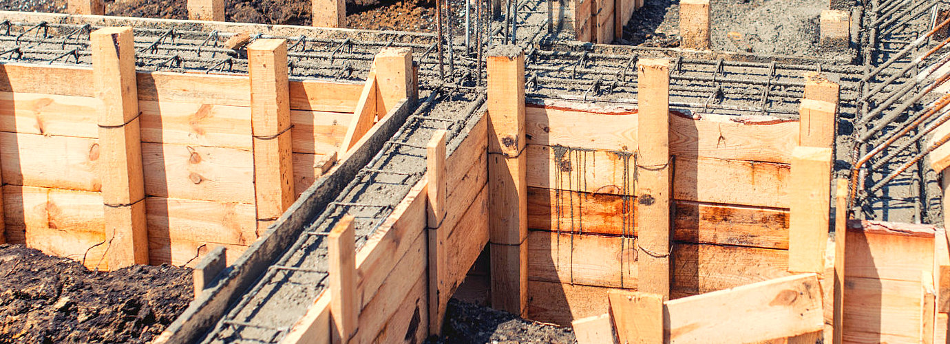 house building construction site, foundation and concrete pouring